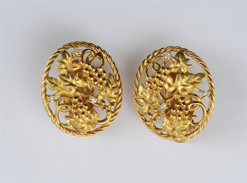 Appraisal: PAIR OF K GOLD AND DIAMOND GRAPEVINE EARCLIPS Diamonds weighing