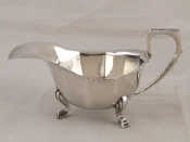 Appraisal: A silver sauceboat in the Art Deco style Birmingham wt