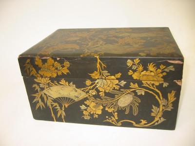 Appraisal: A BLACK LACQUERED TABLE BOX AND COVER of oblong form