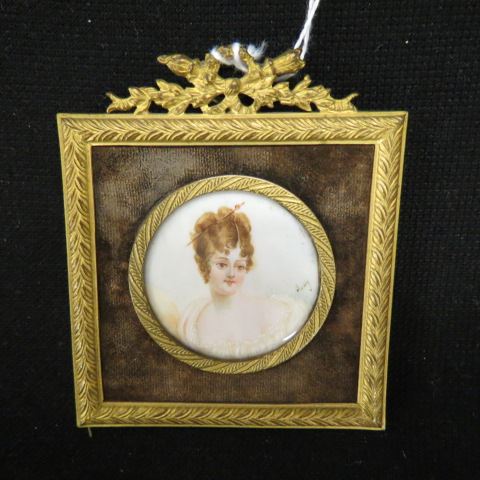 Appraisal: Miniature Painting on Ivoryof a lady artist signed diameter plus