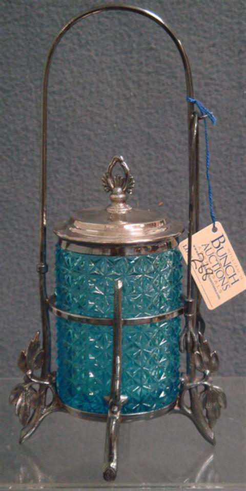 Appraisal: Plated silver Victorian pickle jar blue button pattern insert footed