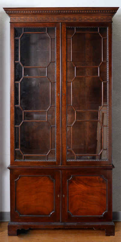 Appraisal: CHINESE CHIPPENDALE STYLE BREAKFRONT BOOKCASE Mahogany bookcase stepped pediment with