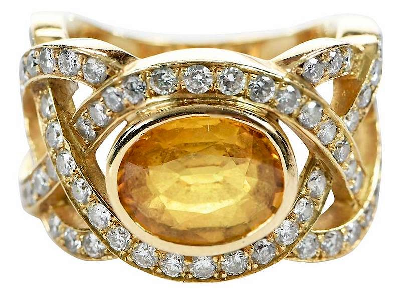 Appraisal: kt Gold Sapphire and Diamond Ring oval faceted yellow sapphire