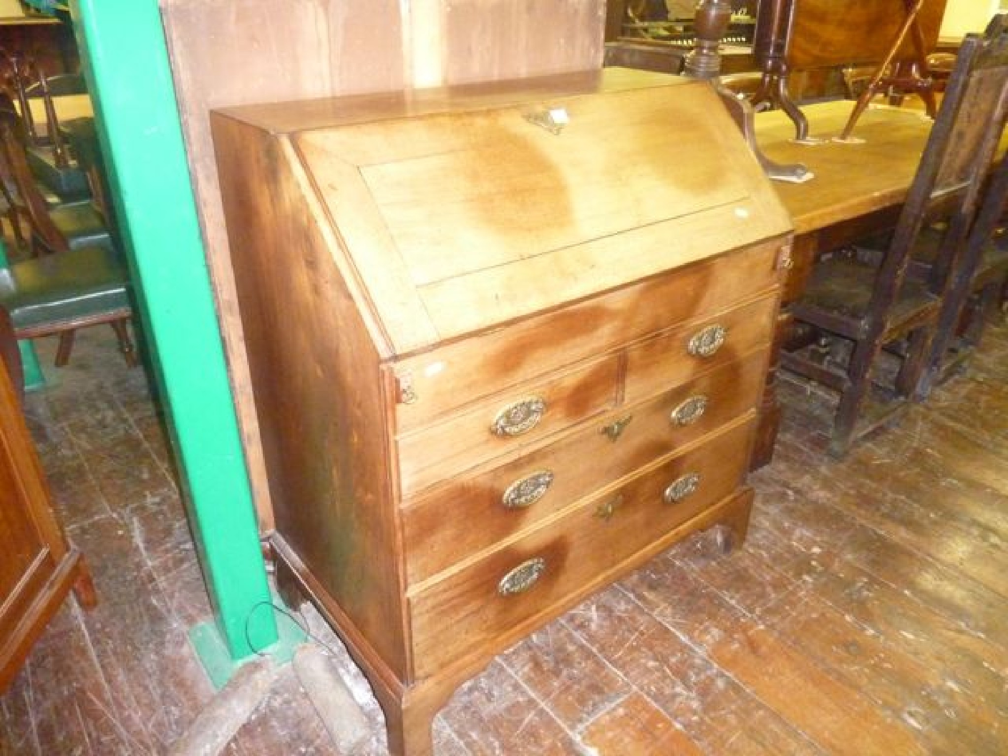 Appraisal: A Georgian mahogany bureau the fall front enclosing a fitted