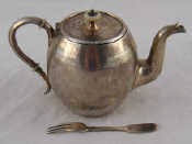 Appraisal: A small Russian silver teapot the barrel shaped body with