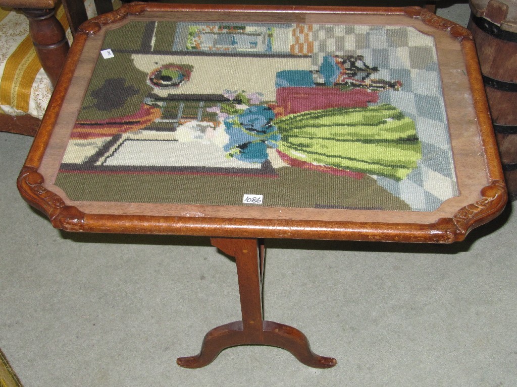 Appraisal: Two mahogany folding tables with embroidered tops