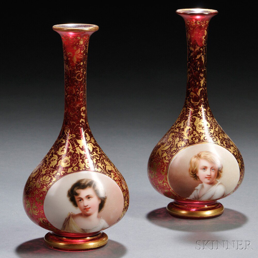 Appraisal: Pair of Bohemian Cranberry Glass Portrait Vases th century bottle