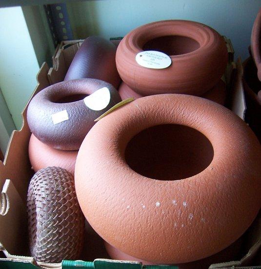 Appraisal: Eight terracotta cactus pots by Mark de le Torre