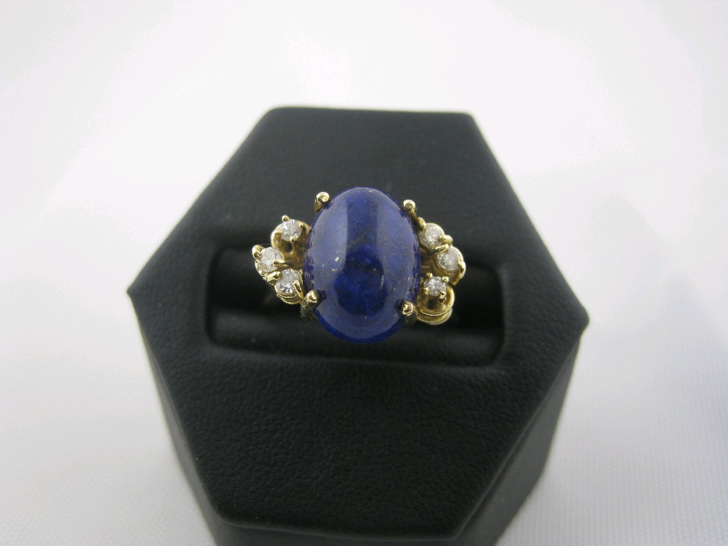 Appraisal: A Lapis Lazuli and Diamond Ring claw-set central lapis cabochon