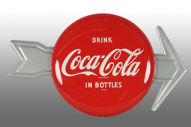 Appraisal: Tin Coca-Cola Button with Arrow Description Includes connecting hardware Nice