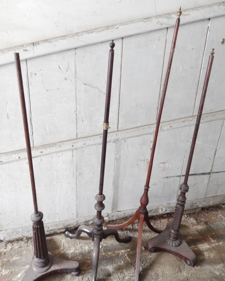 Appraisal: Four various thC fire screen pole stands