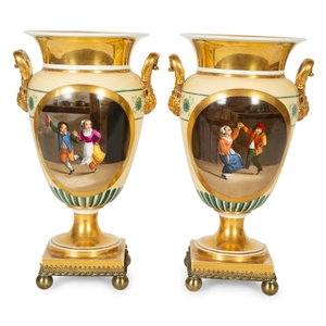 Appraisal: A Pair of Continental Painted Porcelain Urns th Century Height