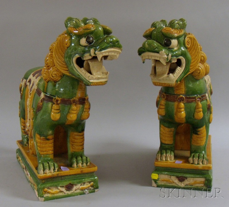 Appraisal: Pair of Chinese Glazed Ceramic Standing Foo Dog Figural Roof