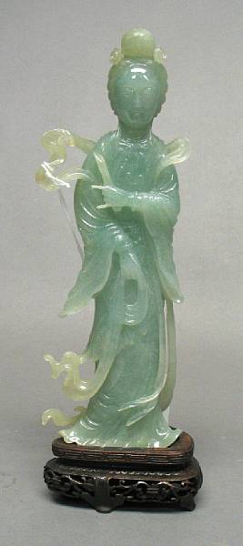 Appraisal: A pale green jadeite carving of a female immortal th