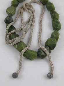 Appraisal: A green hard stone necklace approx cm long together with