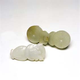 Appraisal: TWO ANTIQUE WHITE JADE BUCKLES Two antique Chinese carved white