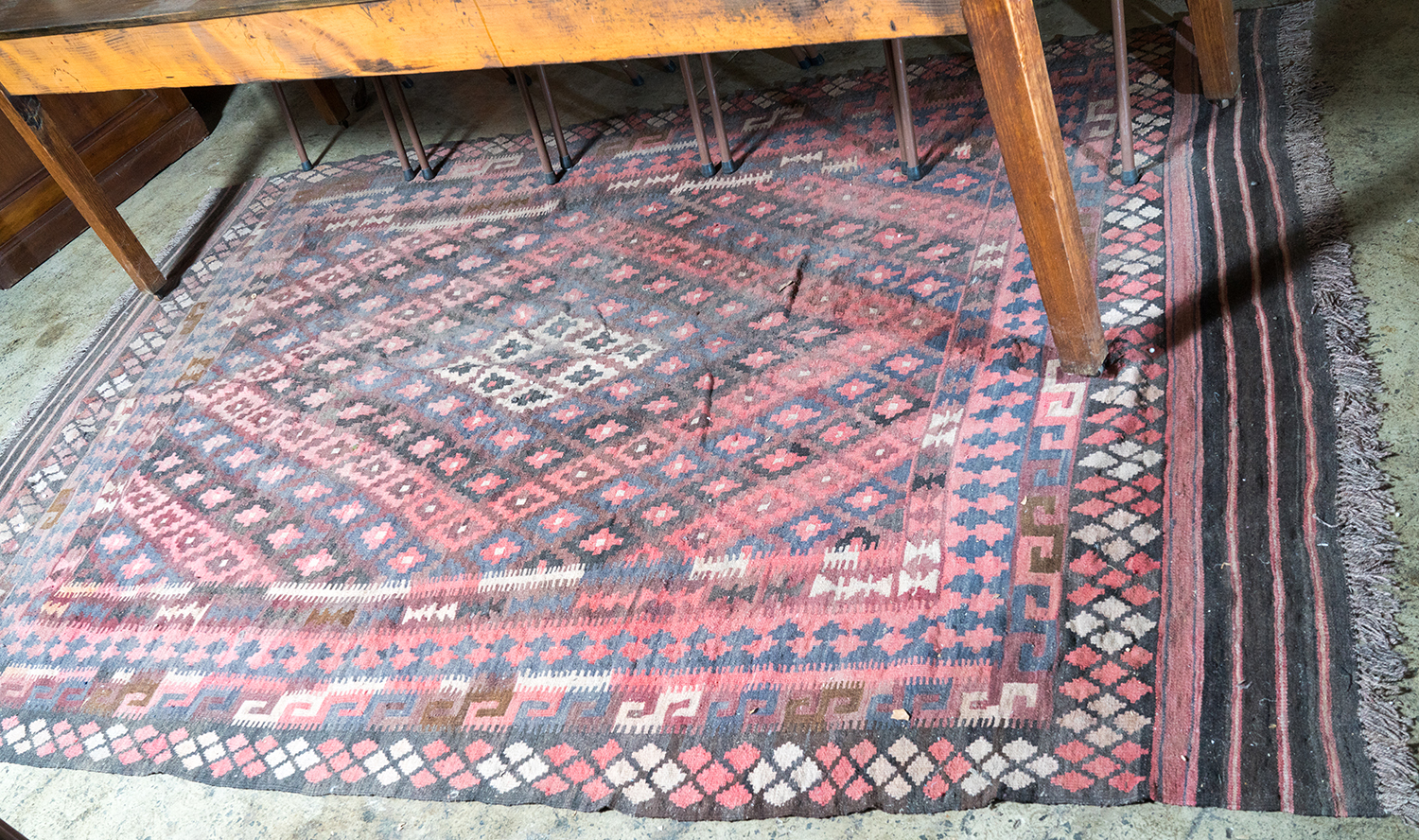 Appraisal: A TRADITIONAL AFGHANI KILIM Pure wool burgandy with brown tones