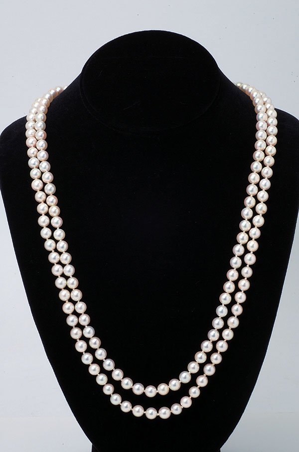 Appraisal: Double strand Akoya saltwater pearl necklace knotted with ornate marked