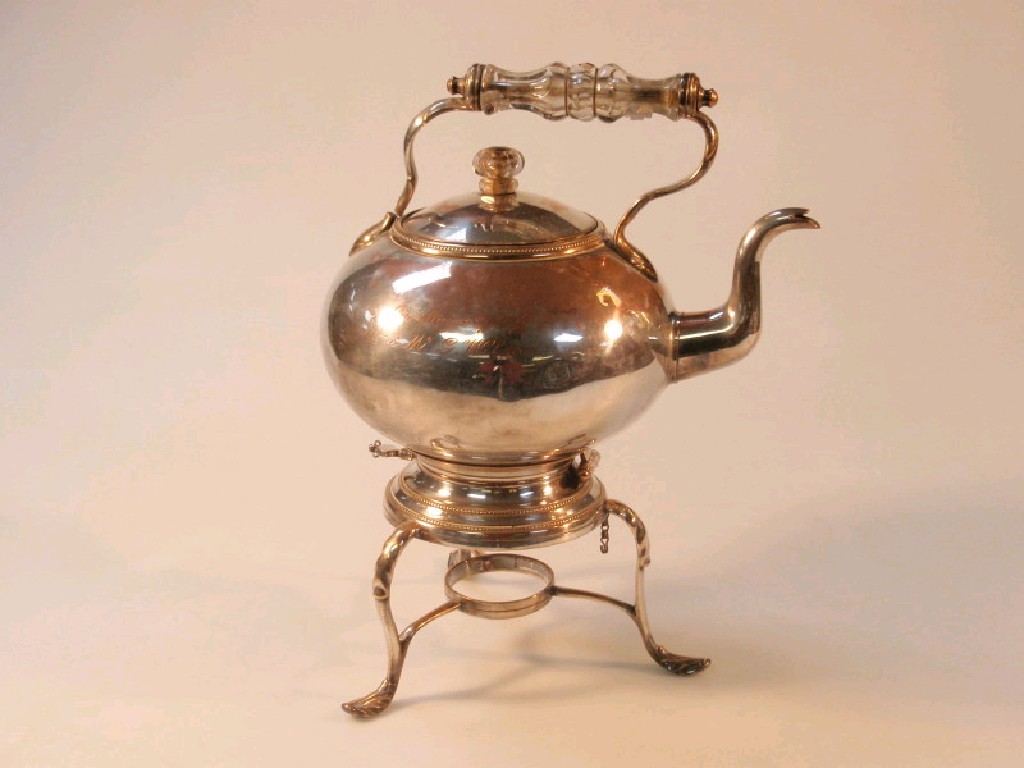 Appraisal: A Victorian silver plated tea kettle on stand with presentation