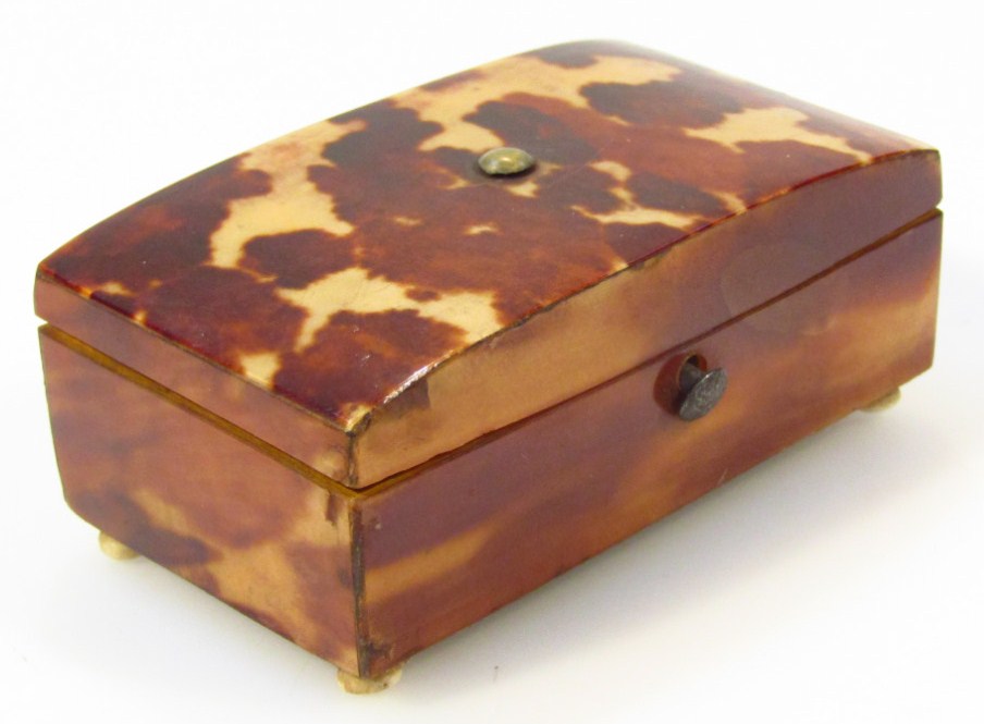 Appraisal: A Victorian tortoiseshell patch box the domed top rectangular lid