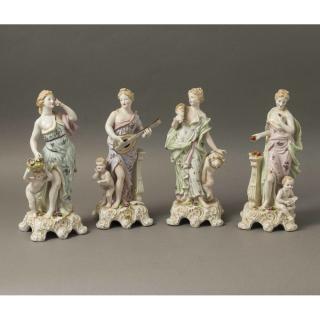 Appraisal: Four Porcelain Figurines Four porcelain figurines depicting female figures with