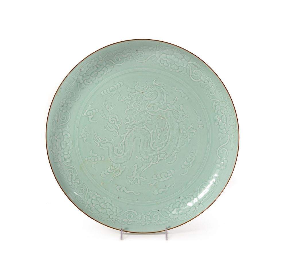 Appraisal: A Large Carved Celadon Glazed Porcelain Charger Diam in cm