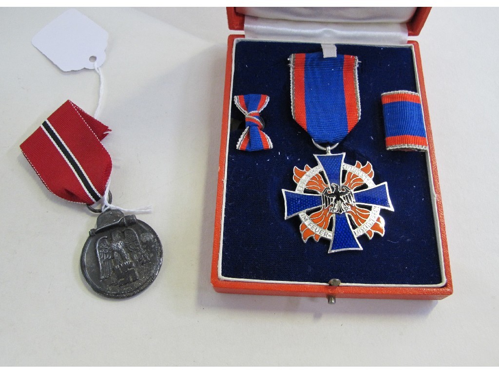 Appraisal: Lot comprising a German enamelled medal and an Eastern Front