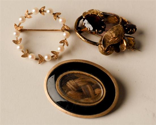 Appraisal: Three Gold Brooches a gold filled circle pin set with