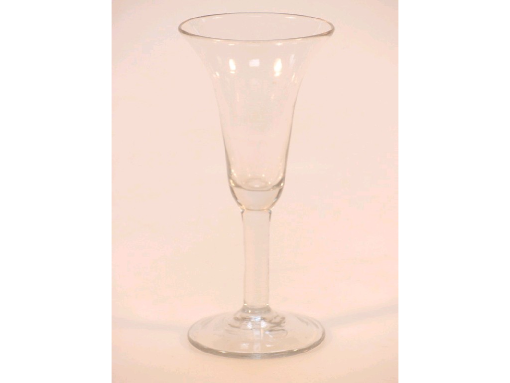 Appraisal: An thC wine glass the bell shape bowl on a