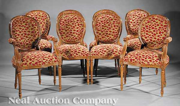 Appraisal: A Set of Eight Louis XVI-Style Carved Fruitwood Dining Chairs