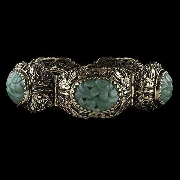 Appraisal: k Green Jadeite Jade Carved Bracelet k yellow gold and