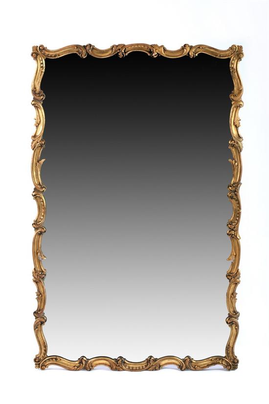 Appraisal: CONTINENTAL ROCOCO STYLE GILT-WOOD HANGING WALL MIRROR th century Reverse