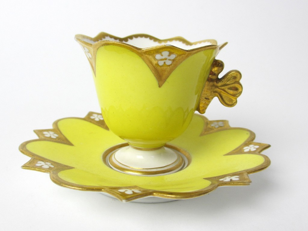 Appraisal: An English yellow ground cabinet cup and saucer with gilt