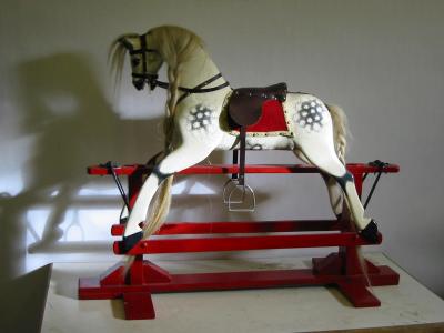 Appraisal: A mid th century rocking horse carved and painted wood