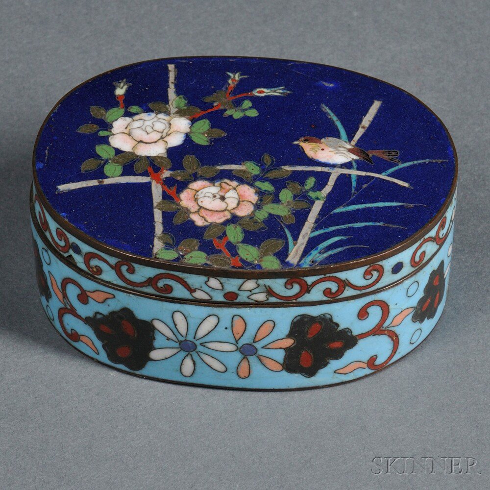 Appraisal: Oval Cloisonne Box Japan late th century midnight blue ground