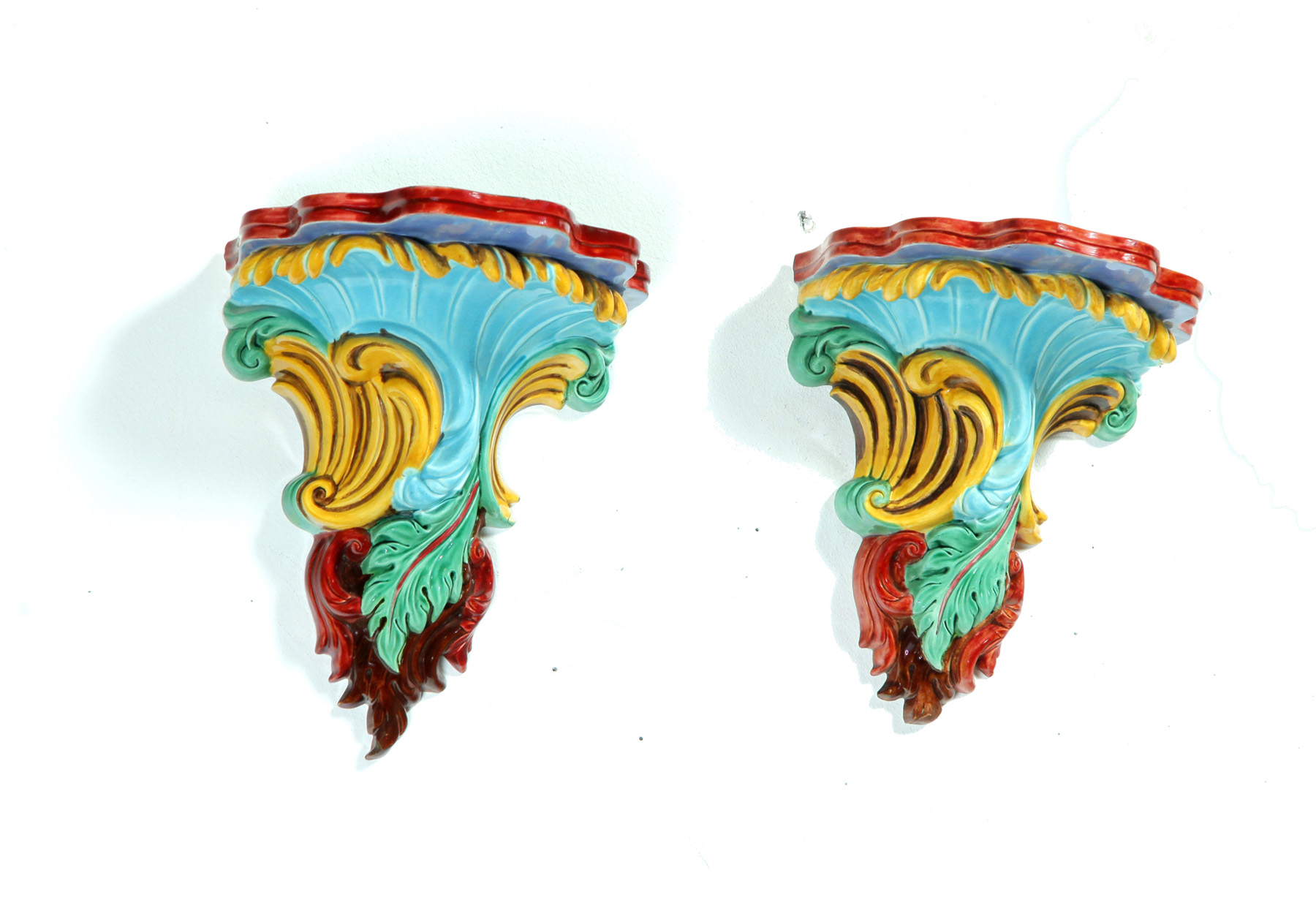 Appraisal: PAIR OF BAROQUE-STYLE MAJOLICA BRACKETS Possibly France th quarter- th