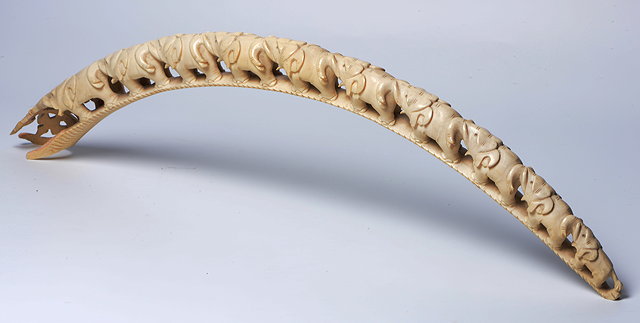 Appraisal: AN ANTIQUE CARVED IVORY ELEPHANT BRIDGE OF TEN GRADUATED ELEPHANTS