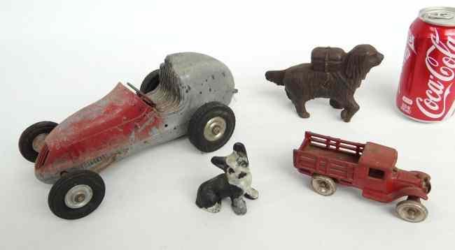 Appraisal: Lot including small iron dog dog bank cast iron truck