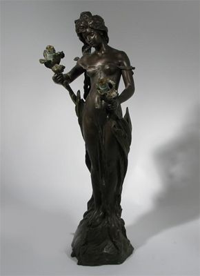 Appraisal: An Art Nouveau spelter figural lamp cast from a model