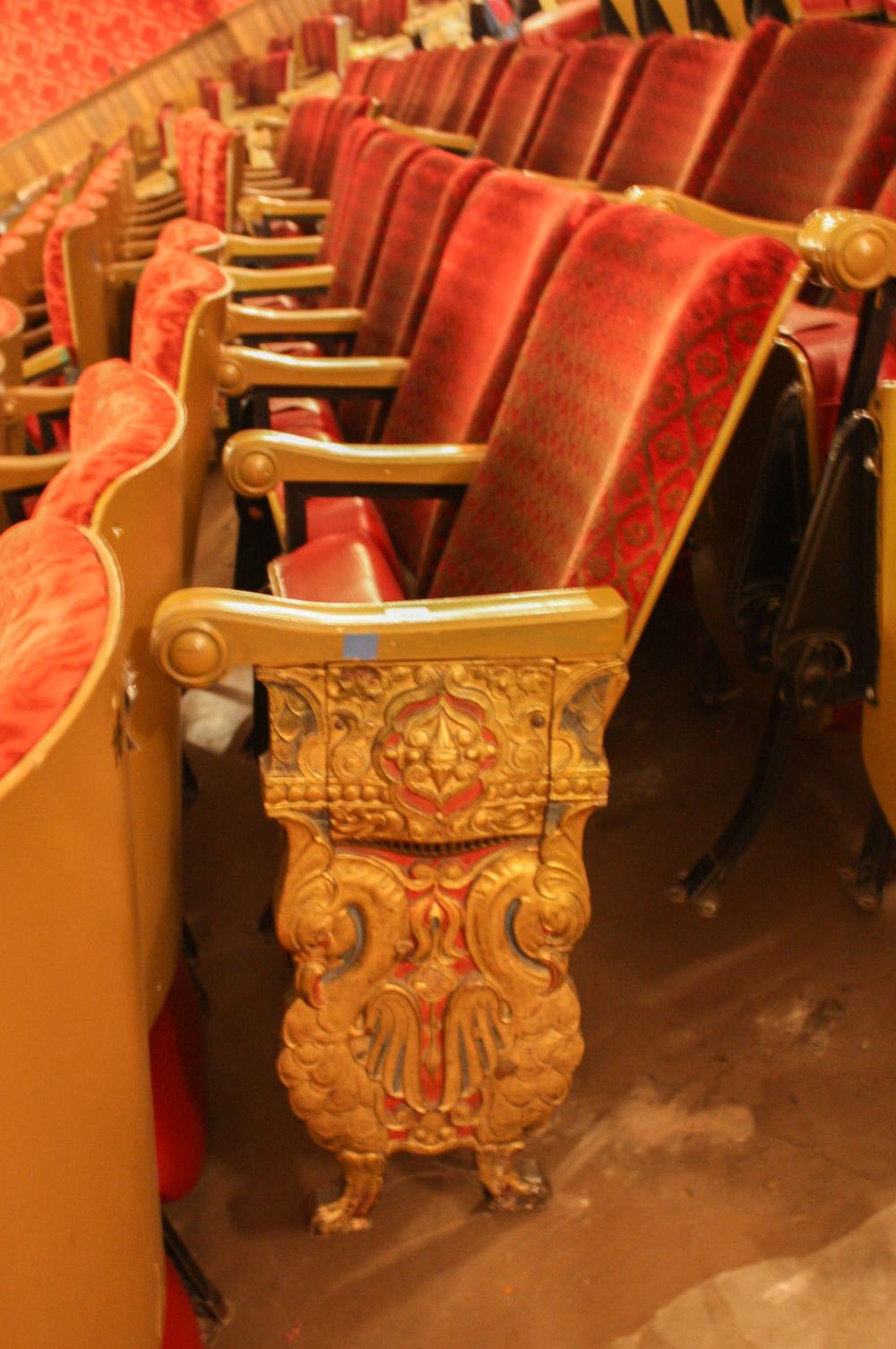 Appraisal: A ROW OF TEN VINTAGE THEATER SEATS approximate length