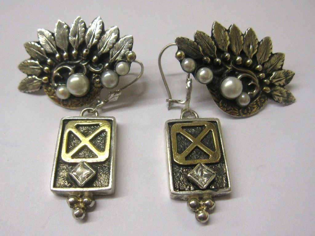 Appraisal: Leaf decorated silver and gold cultured peal set earrings and