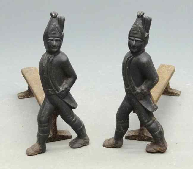 Appraisal: Pair th c cast iron Hessian soldier andirons '' Ht