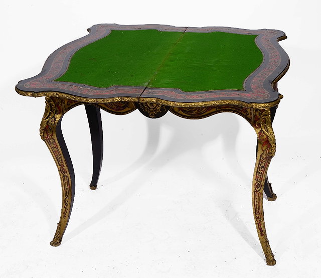 Appraisal: A FRENCH 'BOULLE' SIMULATED TORTOISESHELL AND BRASS INLAID SERPENTINE FOLD