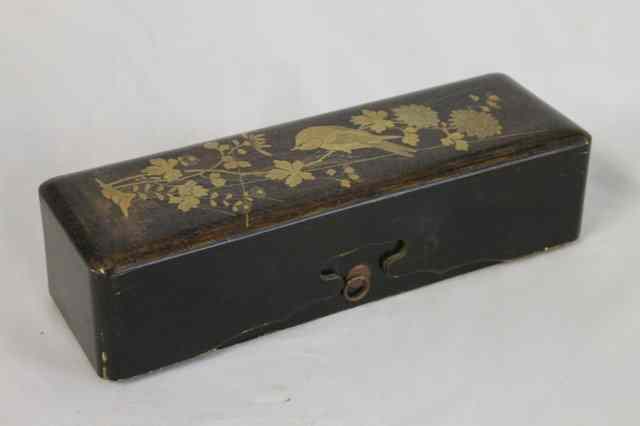 Appraisal: A JAPANESE LACQUER FU-BAKO the cover decorated in gold with