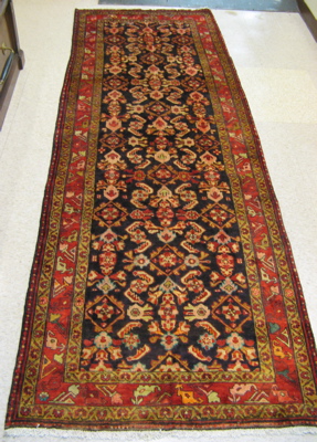 Appraisal: PERSIAN MALAYER RUNNER Northwest Iran hand knotted in an overall