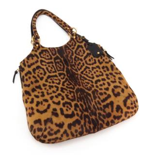 Appraisal: Yves Saint Laurent Printed Cowhide Leather Hobo Style Bag Features