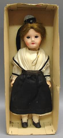 Appraisal: MIB painted bisque doll Stationary blue eyes closed mouth brown