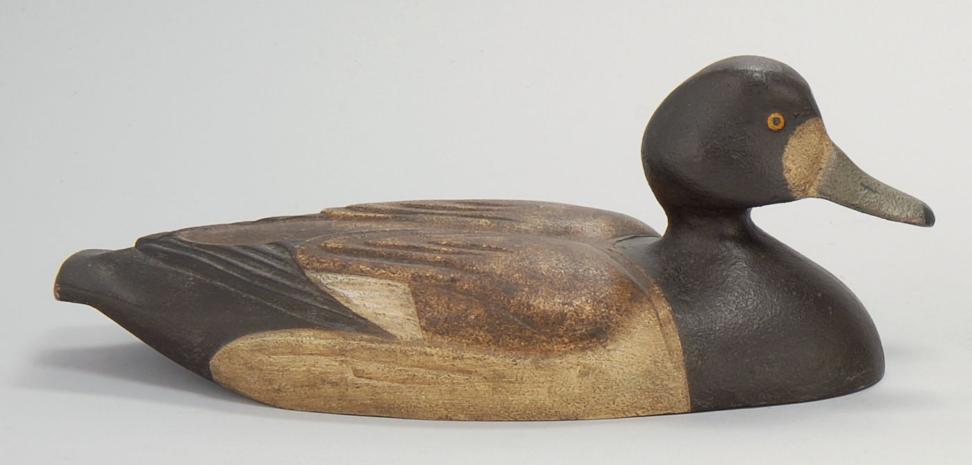 Appraisal: PAIR OF CAST METAL BLUEBILL DECOYS Mid- th CenturyFrom Canada