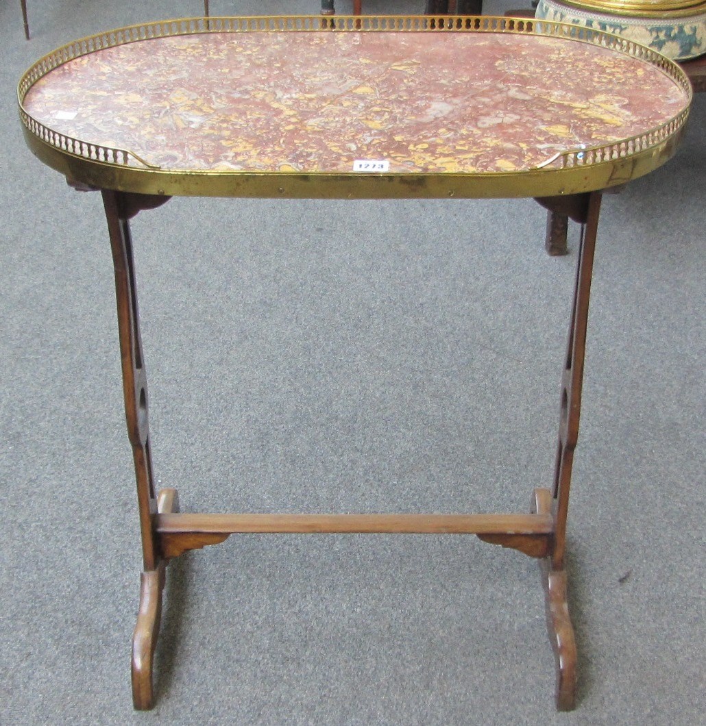 Appraisal: A th century French gilt metal mounted marble top oval