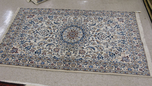 Appraisal: PERSIAN SILK AND WOOL NAIN AREA RUG floral and floral